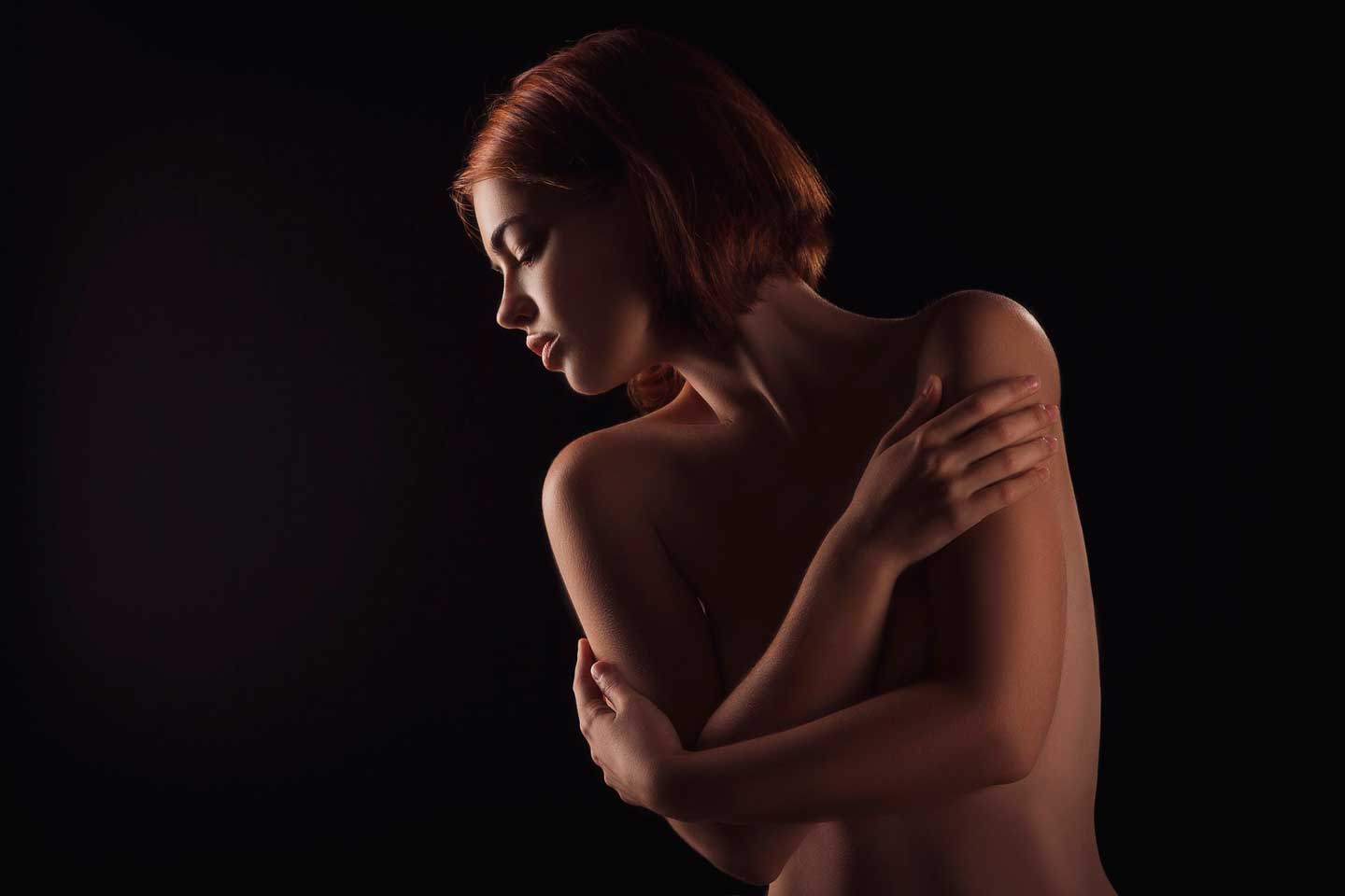 Sensual woman giving sensitive massage
